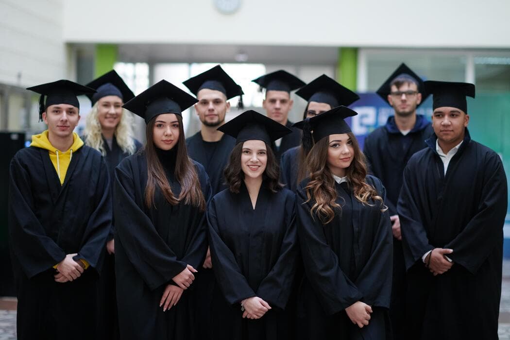 Graduating international students celebrating success